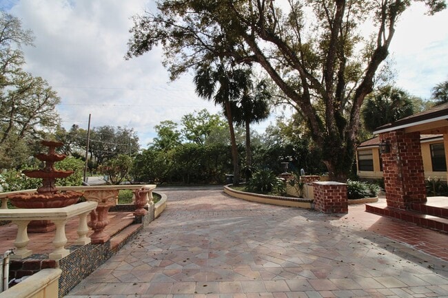 Building Photo - Stunning 3-Bed, 2-Bath Spanish-Inspired Custom Home with Elegant Gardens & Fountains