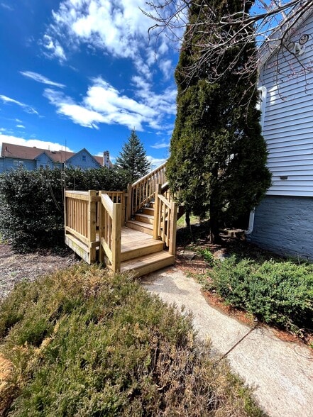 Side entrance to private deck (deck is stained now) - 218 Charter Oak St