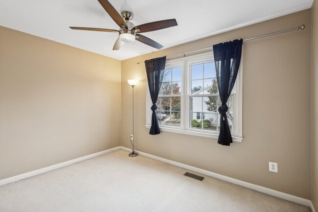 Building Photo - Modern Brick End-Unit Townhome with Stunning Upgrades and Serene Wooded Views