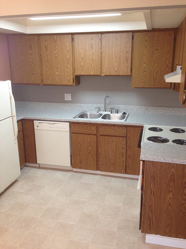 Kitchen with updated solid surface countertops - Edmonds Crest
