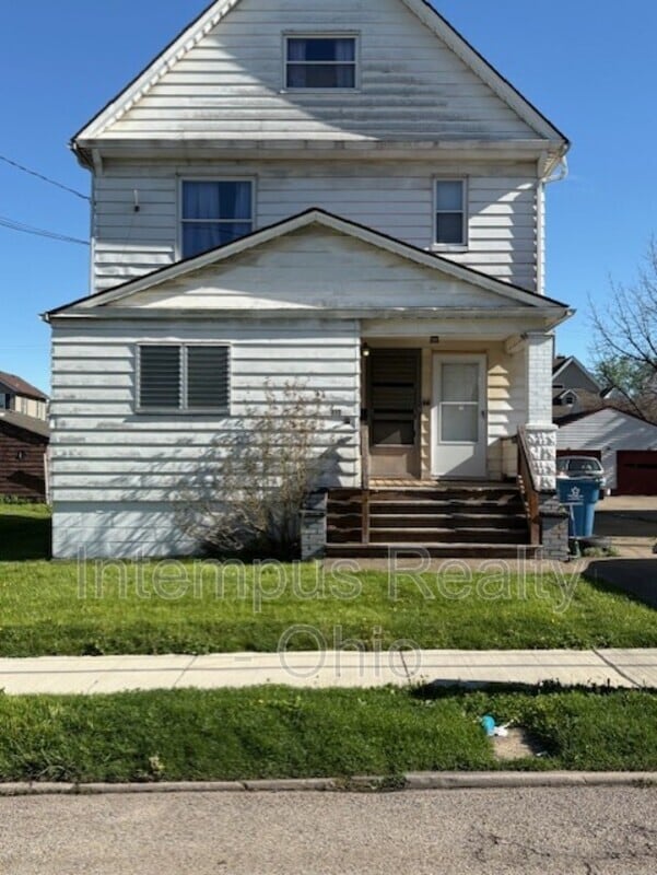 Building Photo - 112 E. Second Street - Down