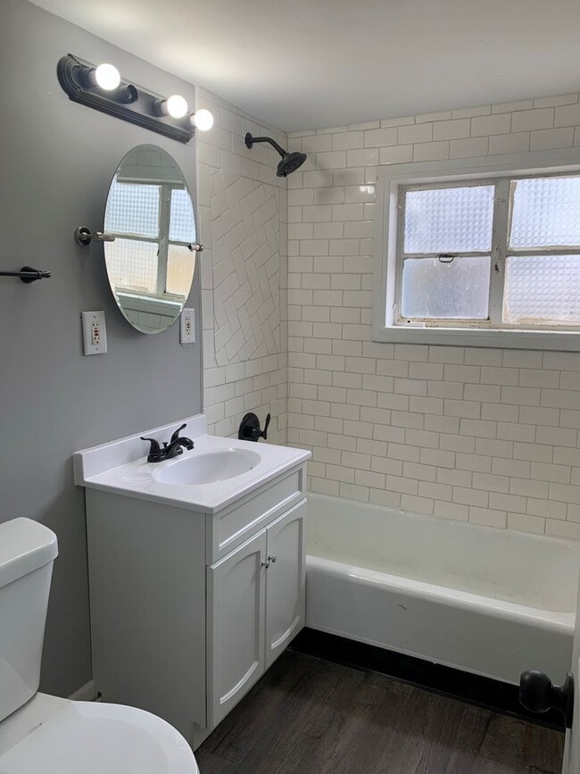 Building Photo - Move-In Ready 2BR Ranch – Fresh Paint, New Floors, & Off-Street Parking!