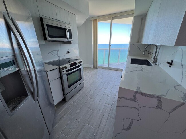 Building Photo - 6301 Collins Ave