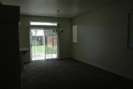 Building Photo - Single story 4 bedroom and two bath home i...