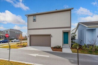 Building Photo - MOVE IN SPECIAL-Beautiful Brand New 1/1 Garage Apartment in Laureate Park, Lake Nona
