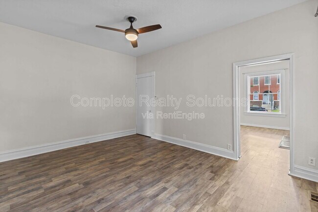 Building Photo - 3402 Dunnica Ave