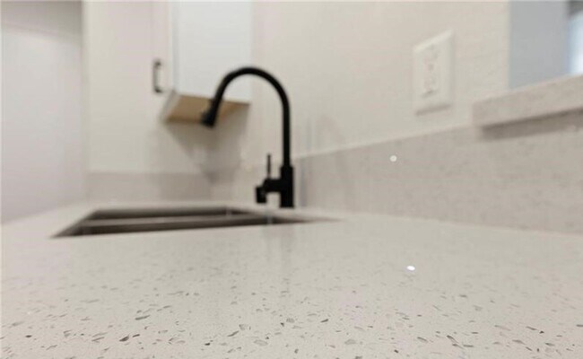 Building Photo - Upgraded 2 bedroom condo in guard gated co...