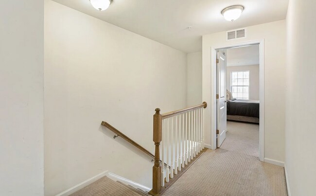 Upstairs has all new LVP flooring now NO CARPET - 6907 Stoddert Ln