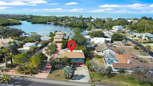 Building Photo - 4 Bed Waterfront Paradise with Pool, Dock & Gulf Access in Baileys Bluff