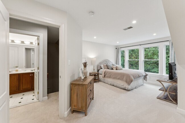 Building Photo - Discover this stunning four-level townhous...