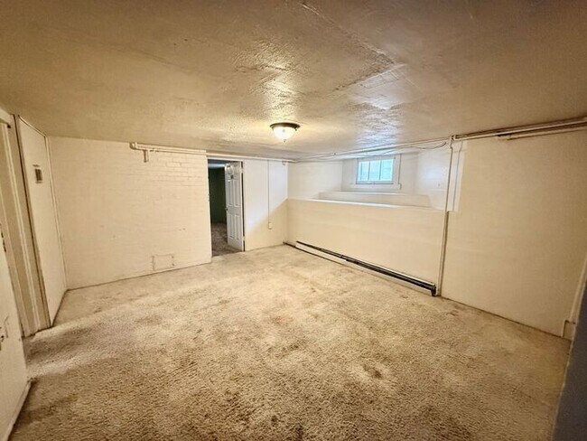 Building Photo - 1/2 Off First Months Rent! 3 Bed + 2 bonus rooms in basement, 2 Bath Home NEAR CSU! Flexible leas...