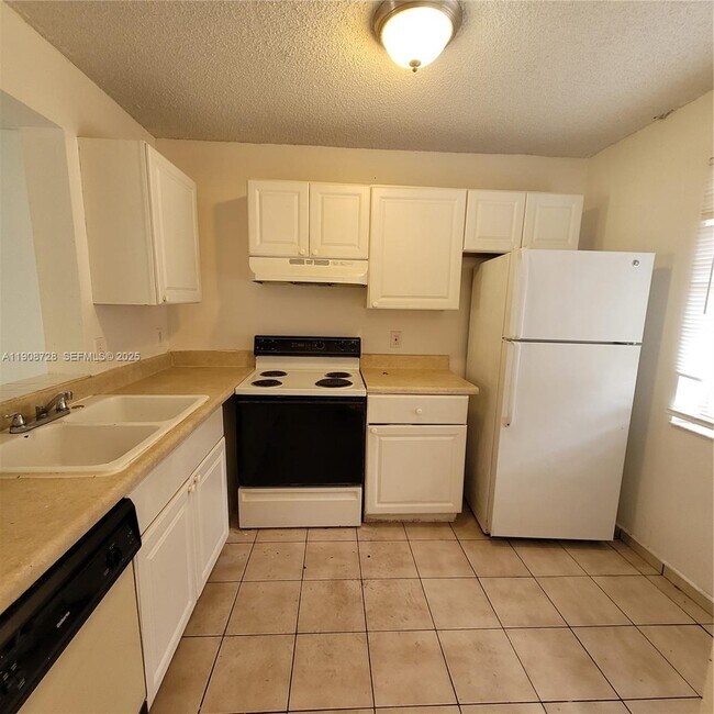 Building Photo - 8540 N Sherman Cir