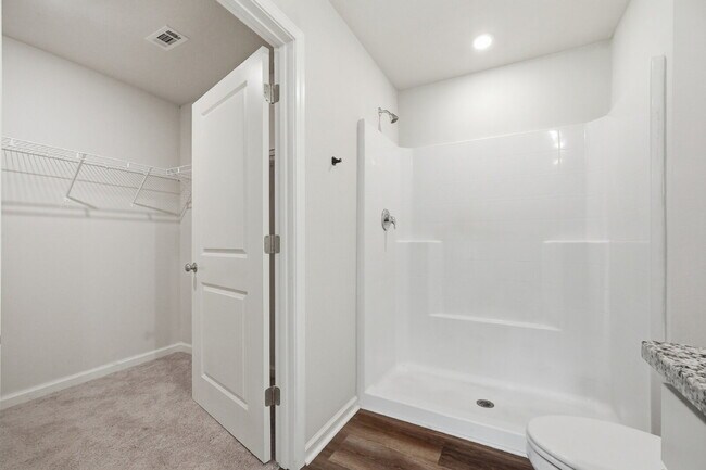 Building Photo - New community! Three bedrooms, two bathrooms and ready for you to move into!