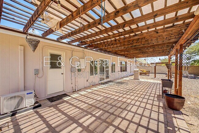 Building Photo - 9847 W Wrangler Dr