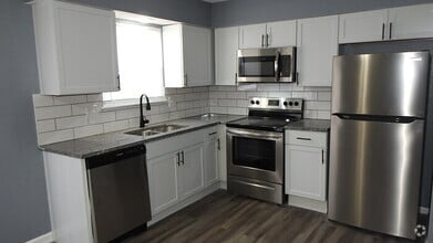 Building Photo - Blue Springs - 2 bed - 1.5 bath Townhome