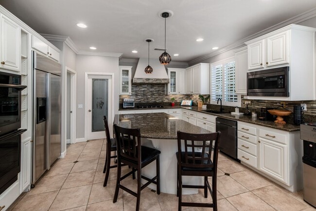 Building Photo - Luxurious home in the Westcliffe Community of San Elijo Approx. 4181sq feet that includes pool/sp...