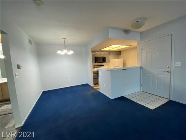 Building Photo - Charming 1-Bedroom Condo in Gated 89128 Co...
