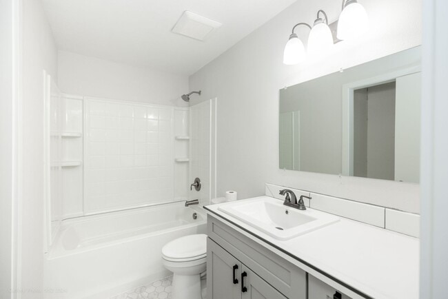 Building Photo - Remodeled 3 Bedroom 2 Bathroom Home, yard, carport