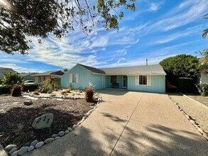 Building Photo - 211 E - Midtown Blue Bungalow | FURNISHED