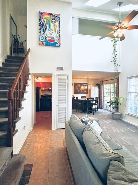 View of unit with cathedral ceilings - 164 Milkweed Ct