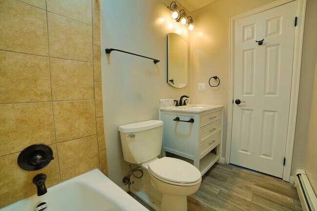 Building Photo - Year lease! Remodeled! 2 parking spots! Wa...
