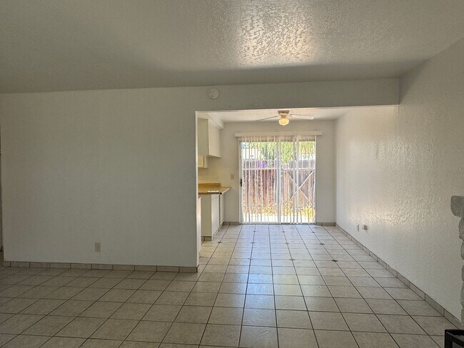 Building Photo - Two Bedroom Triplex with One Bathroom and ...
