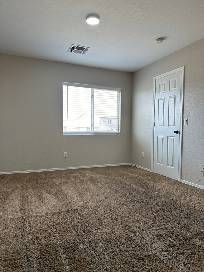 Building Photo - Buckeye, 4 bed, 2.5 bath, huge lot, across...
