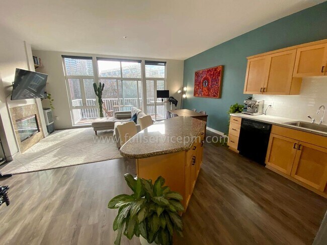 Building Photo - Stylish Capitol Hill Loft Condo w/ Floor-to-Ceiling Windows, Gas Fireplace