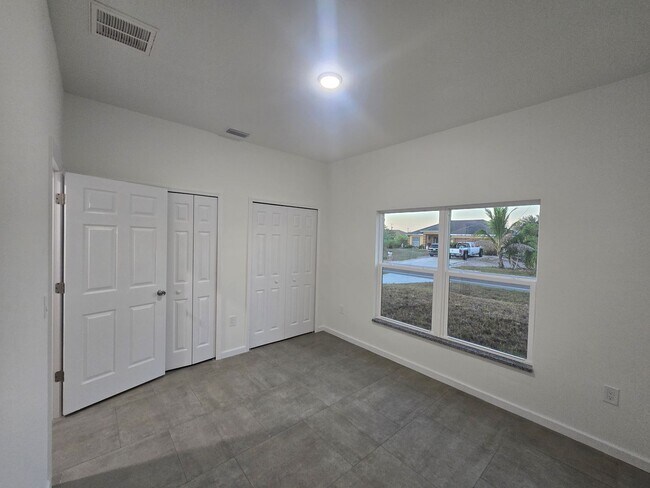 Building Photo - Brand New 2/2/1-Great Location- SW Lehigh Acres