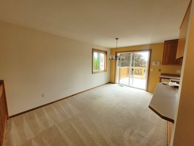 Building Photo - Charming Split-level 4 Bedroom Home - E Mc...