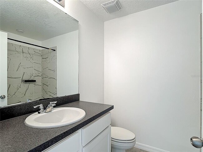 Building Photo - 2512 Blowing Breeze Ave