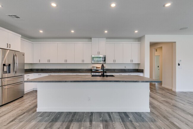 Building Photo - Spacious 4 Bedroom + Loft Tule Springs Home with Heated Pool & 3-Car Garage
