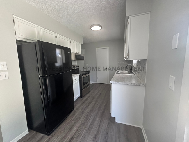 Building Photo - Welcome to your beautifully renovated 4-be...