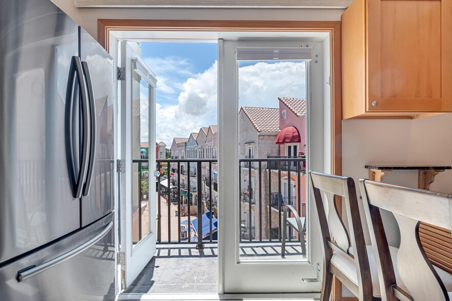 Patio Doors Leading To Shared Balcony - 101 Palm Harbor Pky