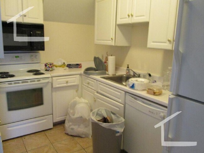 Building Photo - 1-Bed w Central Air!  Parking Spot Included, near Boston Landing Nightlife! Laundry on site