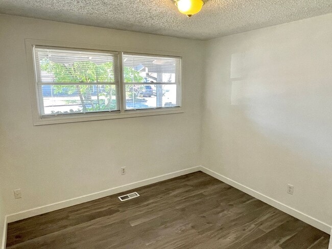 Building Photo - Centennial Remodeled Ranch Home with Large, Fenced Backyard, Attached Garage, Laminate Hardwoods