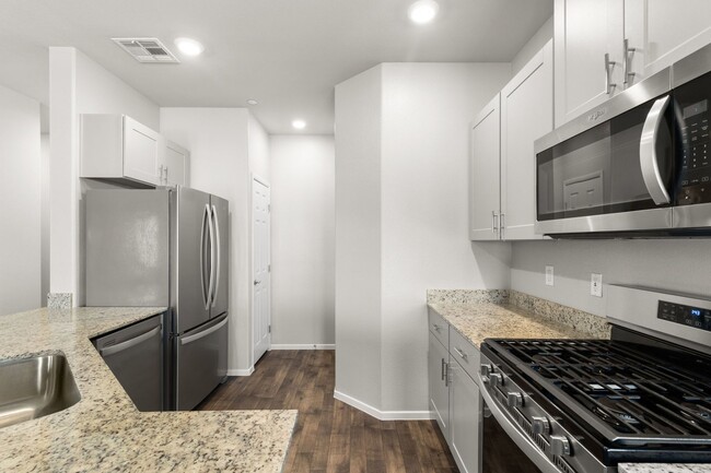 Building Photo - NW!!  2 Bedrooms with Balcony!!  Gated!! C...
