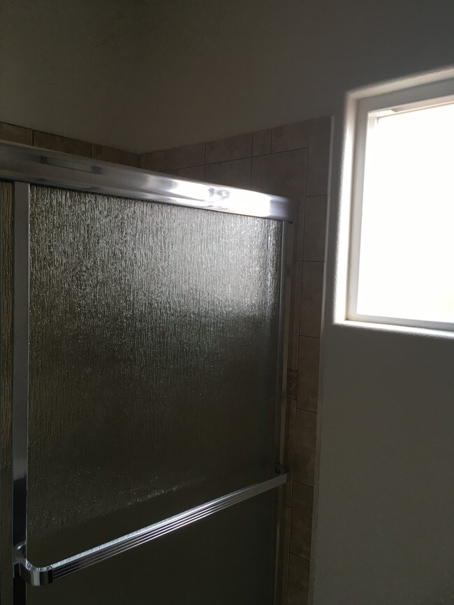 Main bathroom shower and window - 456 E 47th St