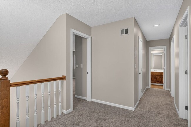 Building Photo - Renovated 3BR/2.5BA Townhome in Blue Valley Schools with Full Basement & 2-Car Garage