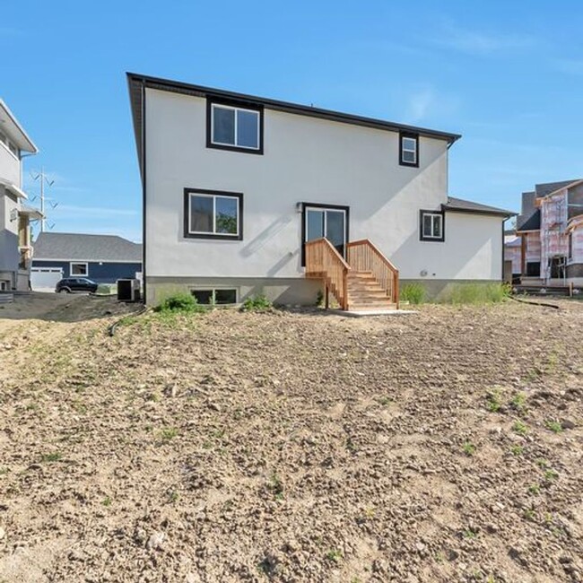 Building Photo - ALMOST NEW MODERN LEHI HOME 3 CAR GARAGE O...