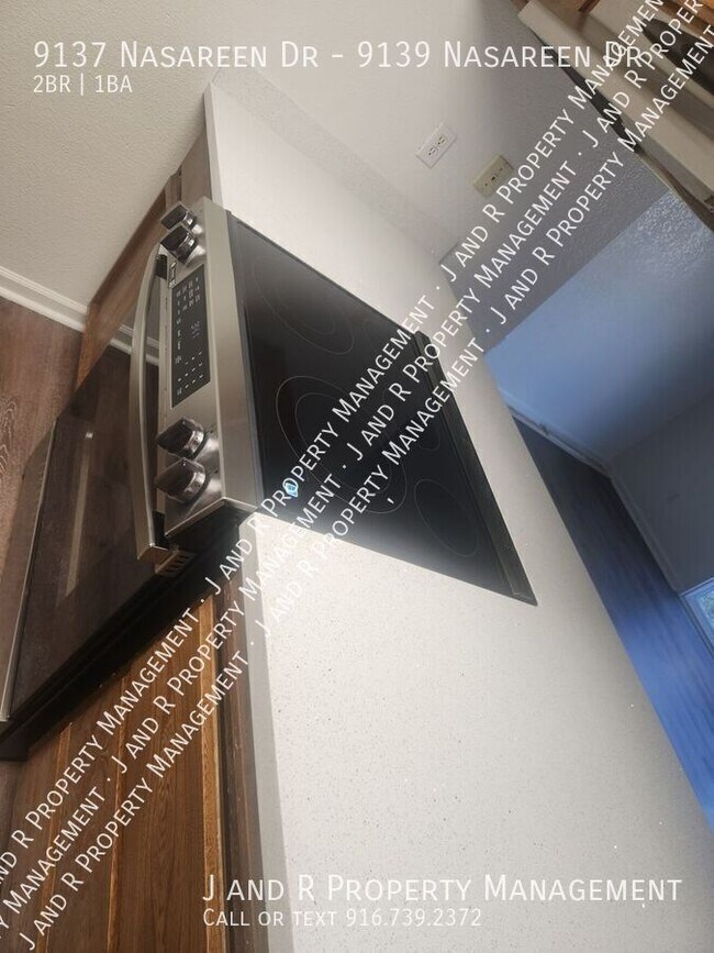 Building Photo - 9137 Nasreen Dr