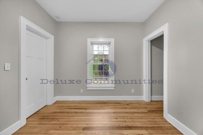 Building Photo - Spacious 4 Bedroom- With Extra room! New Remodel!