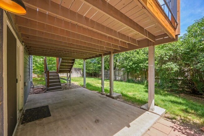 Building Photo - Spacious 4BR Home with Finished Basement, Private Yard & Community Amenities