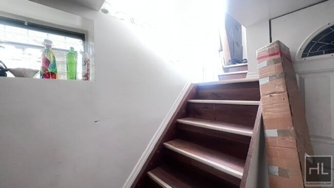 Building Photo - NEWLY RENOVATED 1 BEDROOM SEMI-BASEMNT  EA...