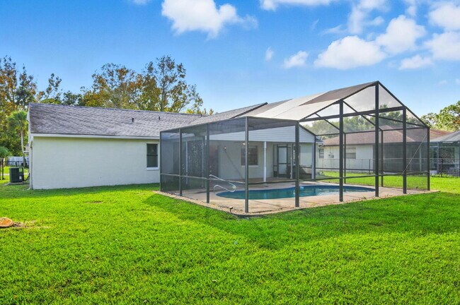 Building Photo - "Charming 3-Bedroom Oasis with 2 Baths on ...