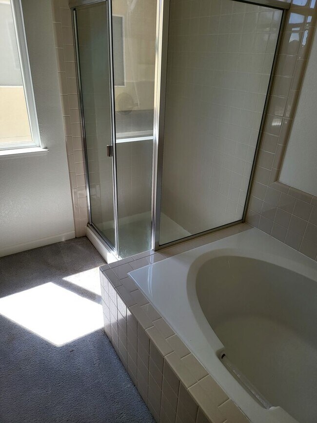 Building Photo - Three Bedroom and Three bathroom home and ...