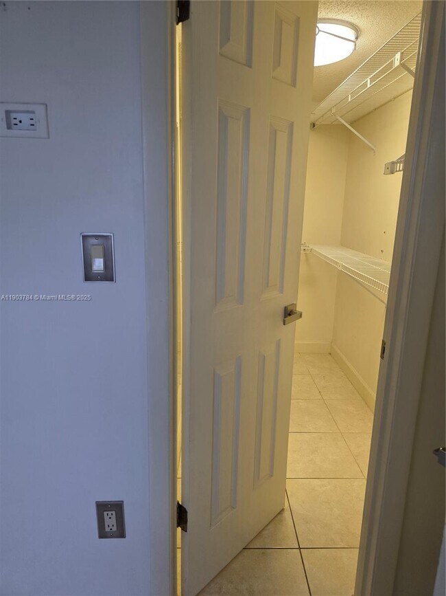 Building Photo - 9917 W Okeechobee Rd