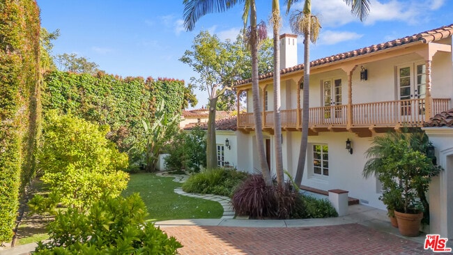 Building Photo - 221 S Beverly Glen Blvd