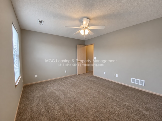 Building Photo - Inviting Harrisonville Townhome with Attached Garage & Cozy Fireplace