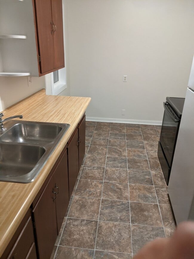 Building Photo - 2-1 House with Garage available now